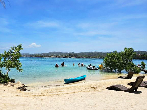 Roatan Clear Boat, Snorkeling, and Private Beach Club Excursion