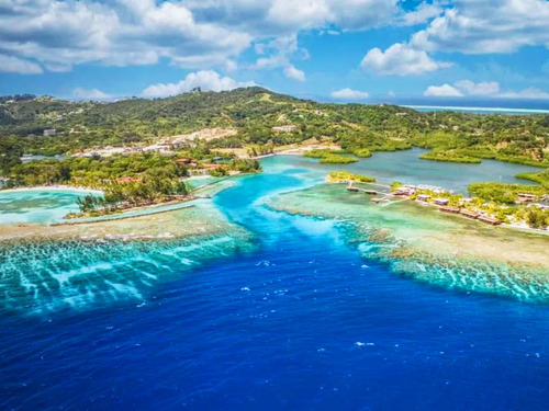 Roatan Clear Boat, Snorkeling, and Private Beach Club Excursion