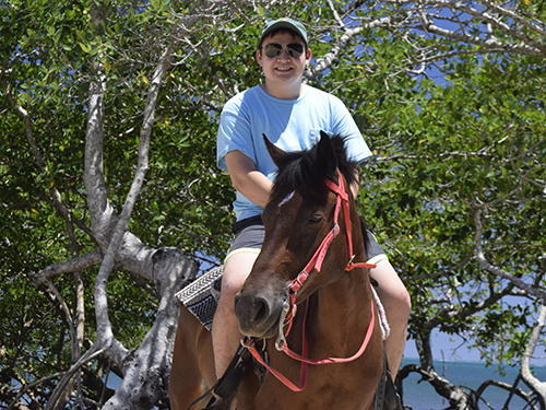 Roatan Horseback Riding and Private Day Pass at Brady's Cay Beach Excursion