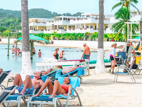 Roatan Mangrove Tunnel with E-Bike Adventure, Food Tasting, and Beach Break Excursion